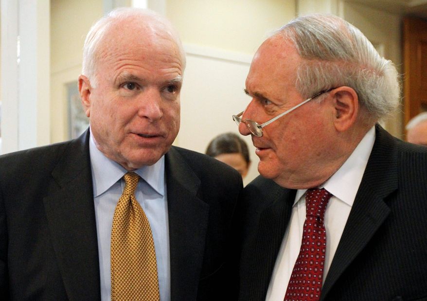 ** FILE ** Sen. Carl Levin (right), Michigan Democrat, and Sen. John McCain, Arizona Republican, confer before talking to the media about the Chinese government&#39;s failure to cooperate in an ongoing Senate Armed Services Committee investigation into counterfeit parts in the Department of Defense&#39;s supply chain, on Capitol Hill in Washington on Tuesday, June 14, 2011. (Associated Press)