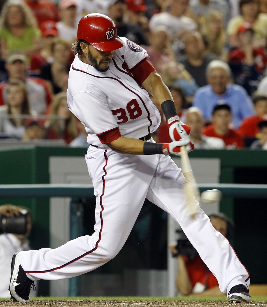 Washington Nationals slugger Michael Morse has signed a multiyear extension with the team. He batted .303 with 31 home runs and 95 RBI last season. (AP Photo/Ann Heisenfelt)