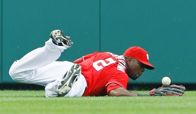 ASSOCIATED PRESS
Nationals center fielder Roger Bernadina can&#39;t come up with a second-inning single by the Orioles&#39; Derrek Lee, who below right collides with Nats second baseman Danny Espinosa. Lee went 9 for 13 in the three-game series, raising his average from .214 to .245.