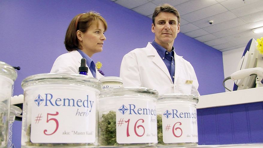 ** FILE ** In this June 20, 2011, file photo, more than 100 patients have signed up to buy marijuana at the Remedy Compassion Center in Auburn, Maine, where Tim and Jenna Smale opened a dispensary. They sell medical marijuana to individuals registered with the state. (Guy Taylor/The Washington Times)