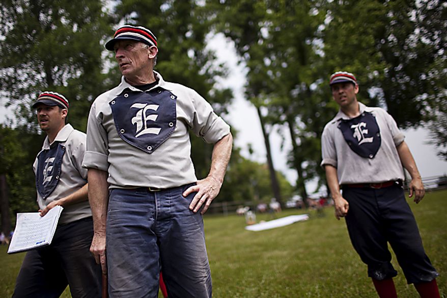 From left, Elkton Eclipse players Lee "Brew" Donelson, Bill "Pockets" Freeland and Tim "Ones" Bower look on as their team bats against the Potomac Nine team during the Loudoun Preservation Society's 19th Century Baseball Day at the Oatlands, in Leesburg, Va., Sunday, June 12, 2011. The teams, part of the Mid Atlantic Vintage Baseball League, all wear the same style of uniforms that teams did in the 1860s, but they don't make their jerseys out of wool due to the heat. (Drew Angerer/The Washington Times)