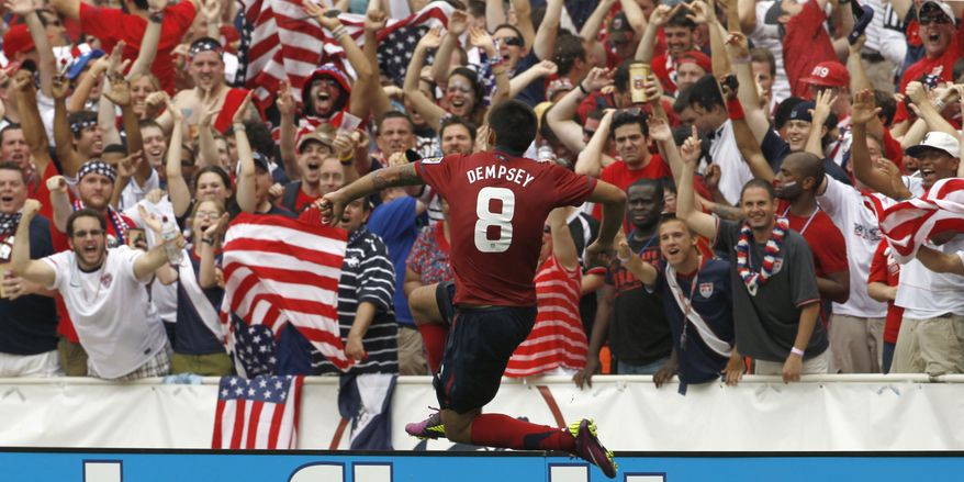United States' Clint Dempsey (8) reacts after his goal during the second half of a CONCACAF Gold Cup quarterfinal soccer match against Jamaica on Sunday, June 19, 2011, at RFK Stadium. The United States won 2-0. (AP Photo/Alex Brandon)