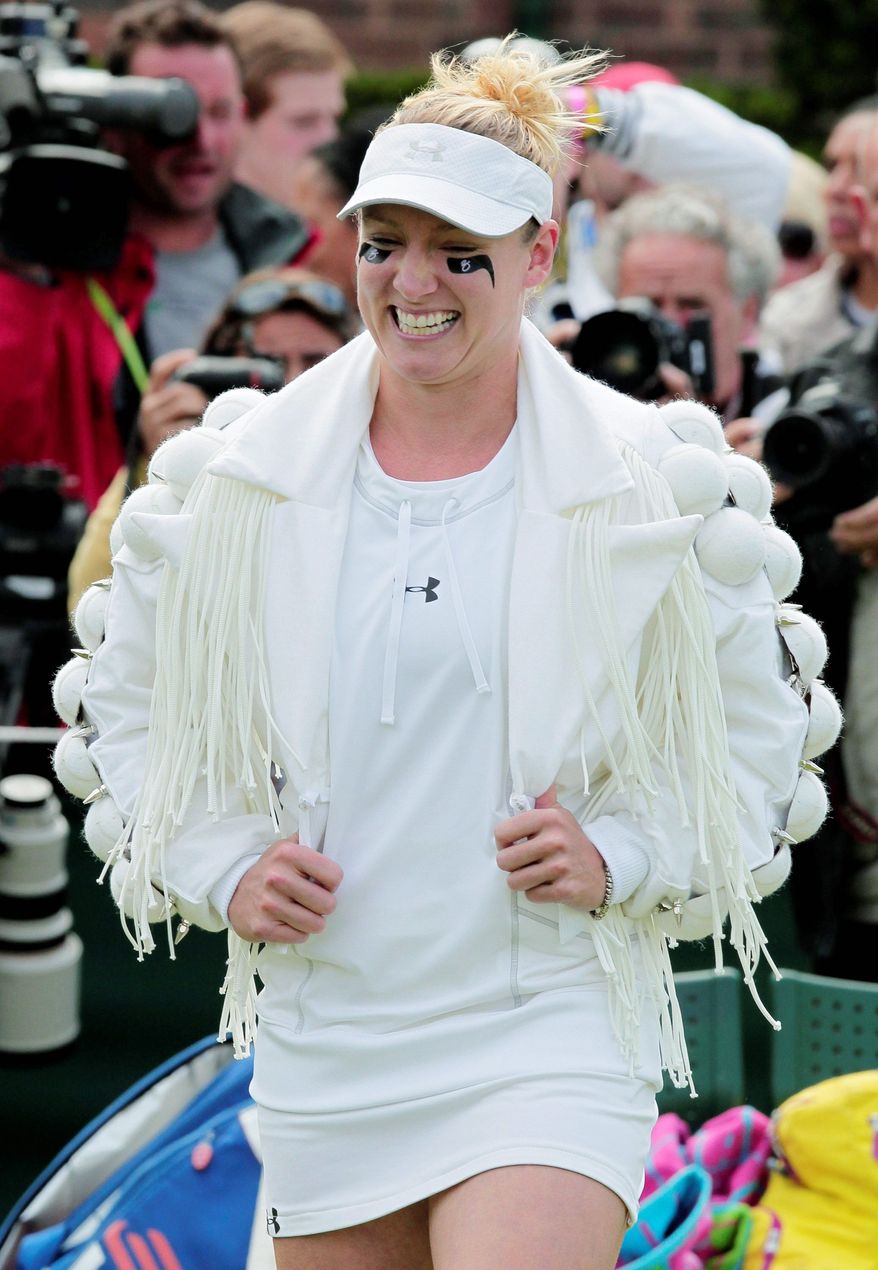 ASSOCIATED PRESS
Bethanie Mattek-Sands arrives on court prior to her match Wednesday at Wimbledon against Japan's Misaki Do. The 26-year-old American, known for outrageous outfits, said her latest eye-catching number was inspired by Lady Gaga. After showing it off, she took the court and lost 6-4, 5-7, 7-5.