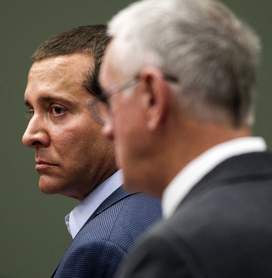 ** FILE ** James Arthur Ray (left) and his lawyer, Thomas Kelly, stand in the courtroom of Judge Warren R. Darrow in the Yavapai County Courthouse in Camp Verde, Ariz., on Wednesday, June 22, 2011. (AP Photo/Tom Tingle, Pool)