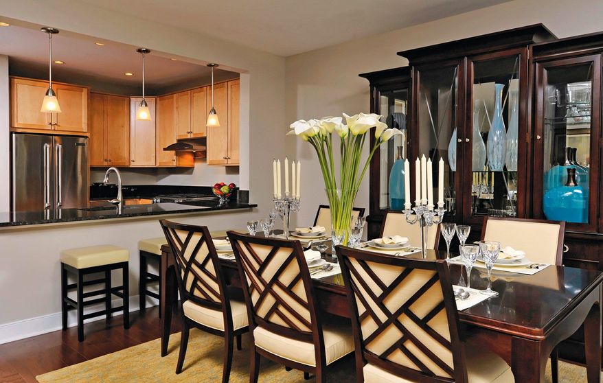 Some homes at Rhodes Hill Square have an open breakfast bar and pendant lighting.