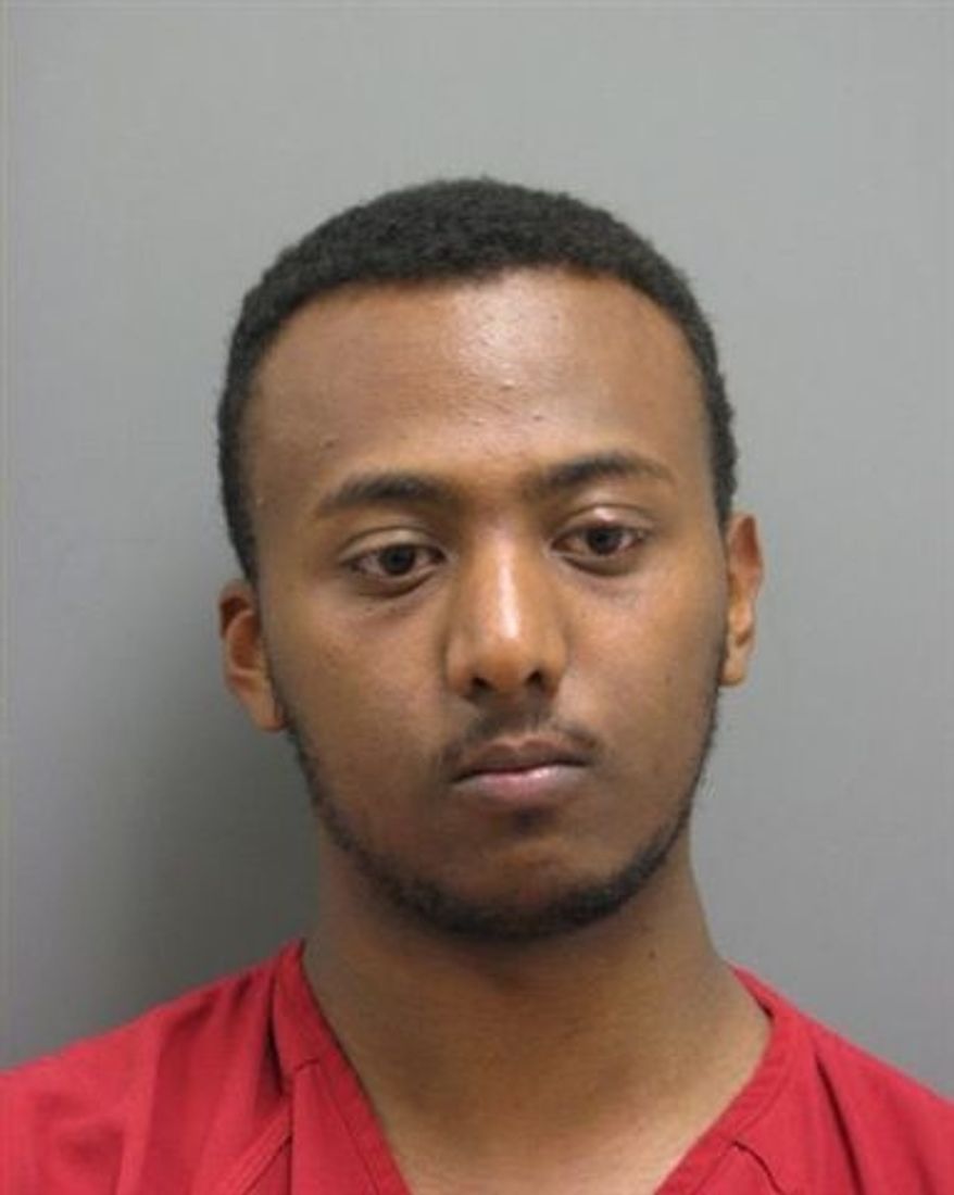** FILE ** This undated file photo released by the Leesburg, (Va.) Police Department shows Yonathan Melaku, 22, of Alexandria, Va., after his May 2011 arrest in Loudoun County, Va., charged with four counts of grand larceny. (AP Photo/Leesburg Police Department, File)