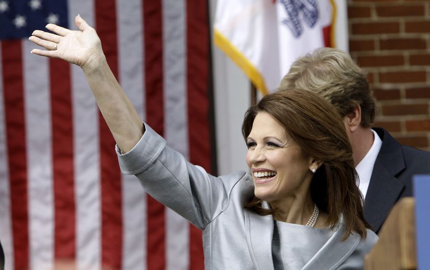Rep. Michele Bachmann, Minnesota Republican, waves to supporters before making her formal announcement to seek the 2012 Republican presidential nomination on June 27, 2011, in Waterloo, Iowa. (Associated Press)