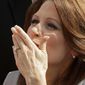 Rep. Michele Bachmann, R-Minn., blows a kiss to a supporter after her formal announcement to seek the 2012 Republican presidential nomination. (AP Photo/Charlie Riedel)