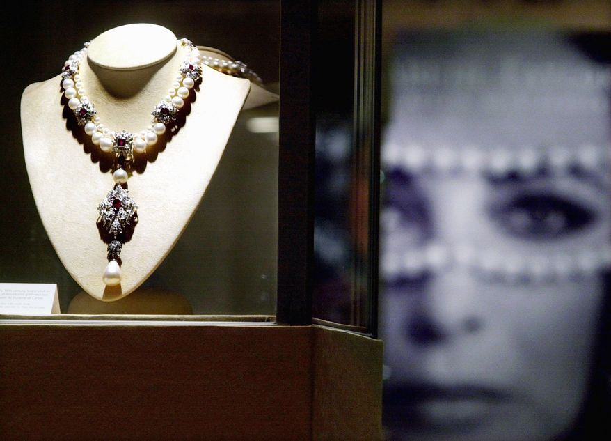 CHRISTIE'S VIA ASSOCIATED PRESS
Elizabeth Taylor had a self-professed "love affair" with jewelry. Her jewels, art and designer clothing are touring internationally before going on auction.ASSOCIATED PRESS
Among Elizabeth Taylor's jewelry is a necklace created to show off a drop pearl found by slaves in the Gulf of Panama in the early 1800s. In