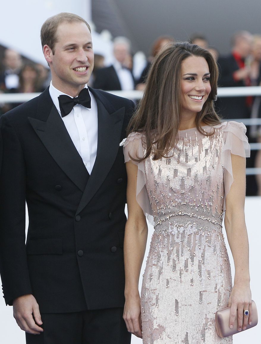 **FILE** Britain's Prince William, the Duke of Cambridge, and his wife Kate, Duchess of Cambridge, arrive in London on June, 9, 2011, at a charity event for Absolute Return for Kids. (Associated Press)