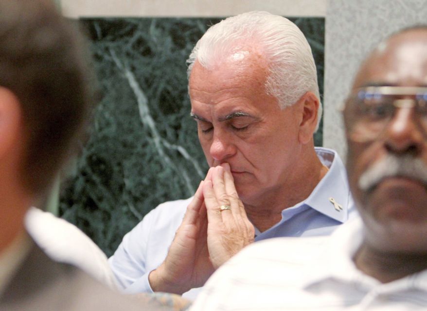 George Anthony sits in the courtroom, waiting for the jury's verdict to be read in the murder case against his daughter, Casey Anthony. (AP Photo/Red Huber, Pool)