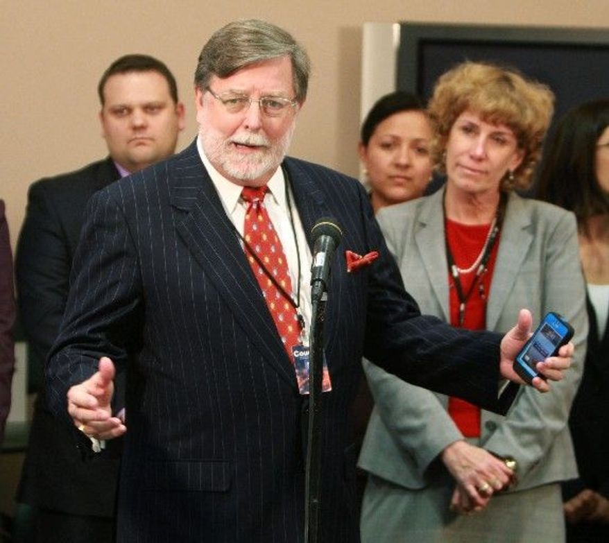 Associated Press photographs
Defense lawyer Cheney Mason answers questions Tuesday after his client, Casey Anthony, was found not guilty in her murder trial in Orlando, Fla. Ms. Anthony had been charged with killing her 2-year-old daughter, Caylee. Mr. Mason assailed cable news coverage of the trial.