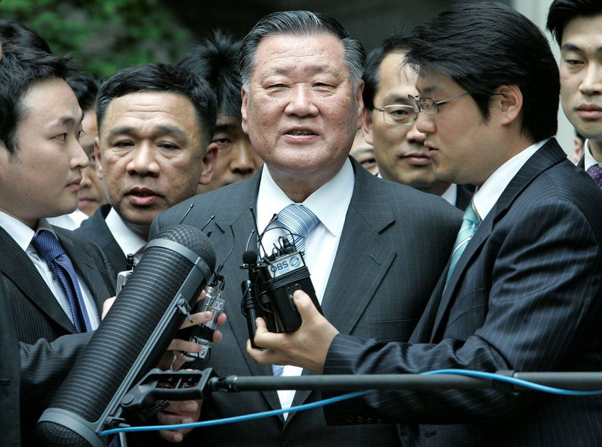 Among the South Korean executives who have be involved in corrupt business practices are Hyundai Motor Chairman Chung Mong-Koo (center). Mr. Chung was found guilty of embezzlement, but a court suspended his sentence because he was deemed "too important to serve time." (Associated Press)