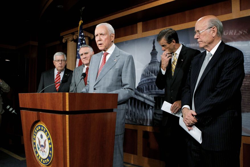 Sen. Orrin Hatch, R-Utah, ranking Republican on the Senate Finance Committee, center, speaks during a news conference on Capitol Hill in Washington, Thursday, June 30, 2011, to charge the Obama Administration of political tactics that undermine pending trade agreements with Colombia, Panama and South Korea. From left are: Sen. Michael B. Enzi, R-Wyo.; Senate Minority Whip Jon Kyl of Ariz.; Hatch; Sen. John Thune, R-S.D.; and Sen. Pat Roberts, R-Kan. (Associated Press)