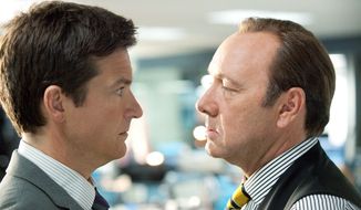 The new comedy &quot;Horrible Bosses&quot; features Kevin Spacey (right) as the sadistic employer of Jason Bateman&#39;s character. (Warner Bros. Pictures via Associated Press)