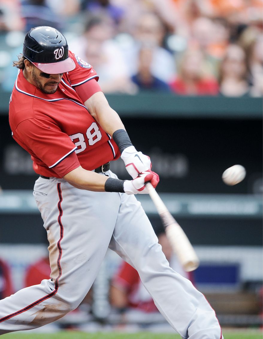 ASSOCIATED PRESS PHOTOGRAPHS
Starting pitcher Livan Hernandez (top left) could be on the move again; the Nationals traded him in 2006. Right fielder Jayson Werth (top right) hasn't lived up to his huge free agent contract, but second baseman Danny Espinosa (middle right) and first baseman Michael Morse (above) have been pleasant surprises. The face of the franchise, injured Stephen Strasburg, isn't expected back in D.C. until 2012.