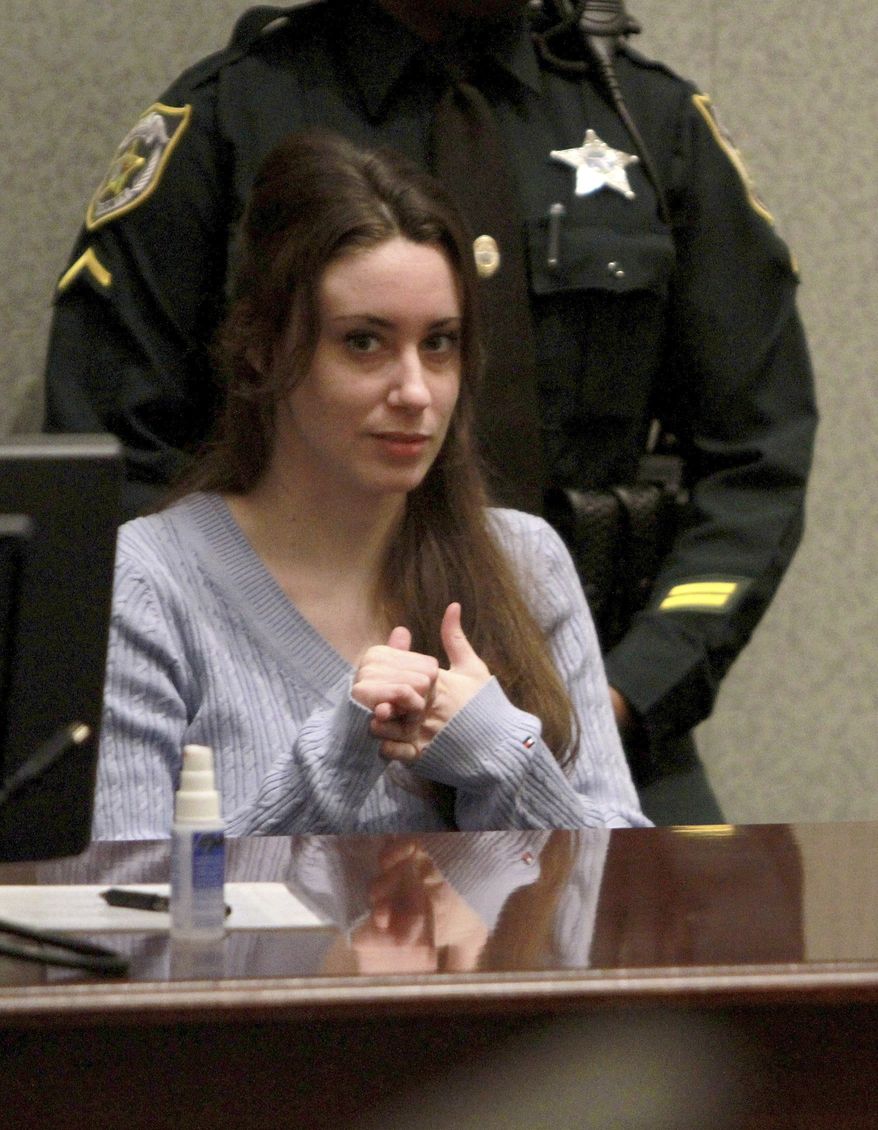 ** FILE ** Casey Anthony sits in the courtroom before a sentencing hearing in Orlando, Fla., on Thursday, July 7, 2011. Anthony was acquitted on charges of killing her 2-year-old daughter, Caylee, in 2008 but was found guilty on four charges of lying to law enforcement officers. (AP Photo/Joe Burbank, Pool)