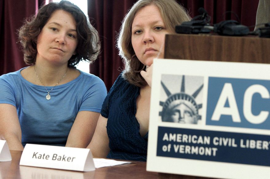 Ming Linsley (left) and Kate Baker discuss their discrimination lawsuit in Montpelier, Vt., on Tuesday. They say a Vermont resort refused to host their wedding reception because of the owners' personal views on homosexuals. (Associated Press)