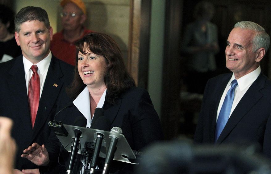 Smiles were bipartisan at a news conference outside the office of Minnesota Gov. Mark Dayton (right), a Democrat, in St. Paul, Minn., Tuesday as Republican leaders Sen. Amy Koch and Speaker of the House Kurt Zellers joined Mr. Dayton in announcing a special legislative session aimed at getting a budget passed and ending a partial government shutdown. (AP Photo/Minneapolis Star Tribune)