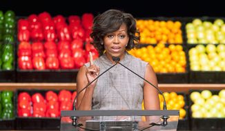 ** FILE ** As part of first lady Michelle Obama&#39;s nationwide campaign to lower childhood obesity rates, Wal-Mart and other retailers plan over the next five years to open or expand 1,500 stores in areas without easy access to fresh produce and other healthy foods. &quot;This is a really big deal,&quot; Mrs. Obama said. (Associated Press)