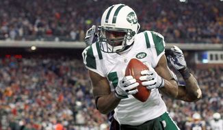 Santonio Holmes is reported to be the Redskins&#39; top priority in free agency. He caught 52 passes last year for the New York Jets. (Associated Press)