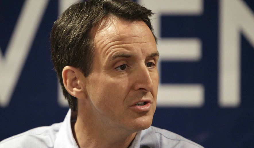 Former Minnesota Governor Tim Pawlenty speaks to local residents at The Sports Page bar &amp; grill, Wednesday, July 20, 2011, in Indianola, Iowa. (AP Photo/Charlie Neibergall) ** FILE **