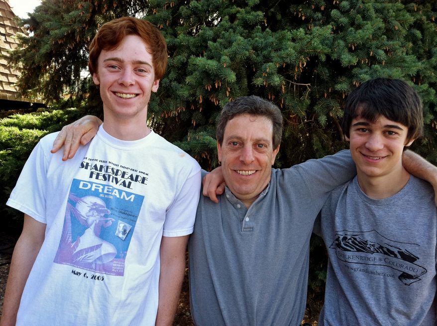 This photo provided by the Gottsegen family shows Sam Gottsegen (left), Jon Gottsegen (center) and Ben Gottsegen in the backyard of their Denver home in late June 2011. Sam, 17, was one of four teens attacked by a mother grizzly bear near Talkeetna, Alaska, on July 23, 2011. (Associated Press)