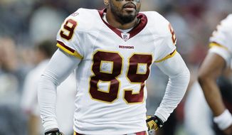 The Washington Redskins re-signed wide receiver Santana Moss to a three-year, $15 million deal Tuesday. (Associated Press)