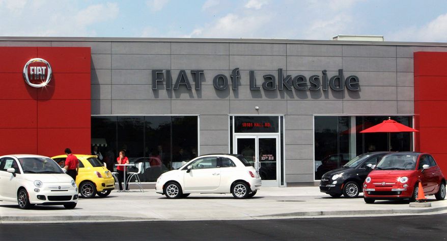 Fiat's chic but affordable 500 model (above, at a dealership in Michigan) will get its U.S. launch soon. The company, now the majority shareholder in Chrysler, plans to open 130 dealerships across the country in the next year in an appeal to both Euro flair and home-spun frugality. (Associated Press)