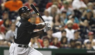Outfielder Mike Cameron will retire after 17 seasons in the major leagues. He had signed a minor league deal with the Nationals this offseason. (AP Photo/Jacquelyn Martin)