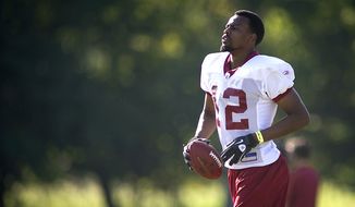 Washington Redskins wide receiver Malcolm Kelly (12) runs through drills during another day of training camp at Redskins Park in Ashburn, Va., Monday, August 1, 2011. (Rod Lamkey Jr./The Washington Times)