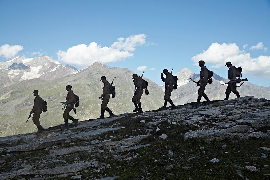 PHOTOGRAPH PROVIDED BY AMRAPALI MEDIA VISION
Actors playing Nazis trek through the Himalayas, standing in for the Alps, in "Dear Friend Hitler," a risible Bollywood film not meant as a farce.
