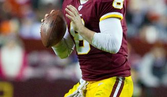 Redskins quarterback Rex Grossman threw for 884 yards and seven touchdowns with an 81.2 passer rating in 2010. (Associated Press)
