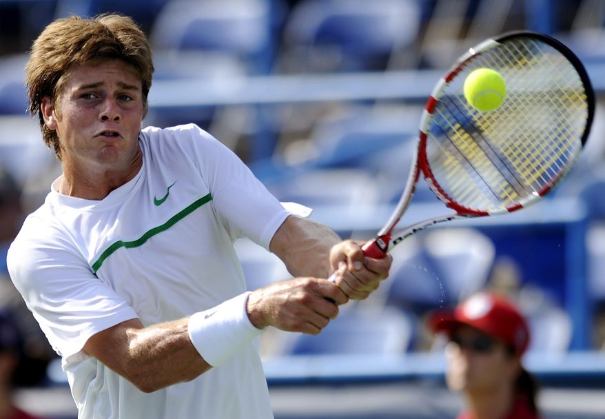 Ryan Harrison returns a shot to Mischa Zverev during a match at the Legg Mason Classic on Tuesday. The 19-year-old American won, 6-3, 1-6, 6-1. (AP Photo/Nick Wass)