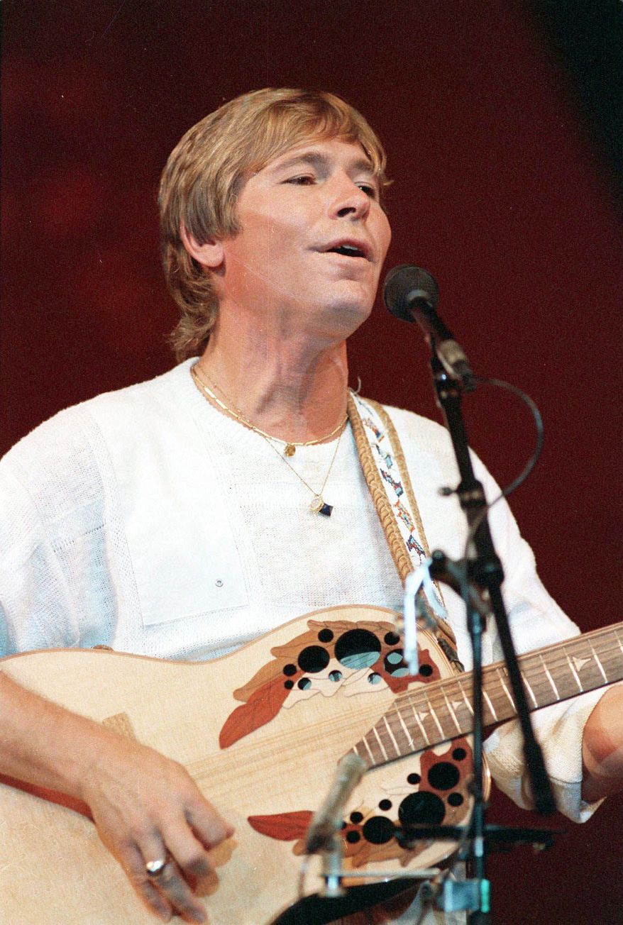 ASSOCIATED PRESS
John Denver's "Rocky Mountain High" is one of Colorado's two state songs, but an effort to name a Rockies peak for him has hit a snag. He's seen here in 1985.