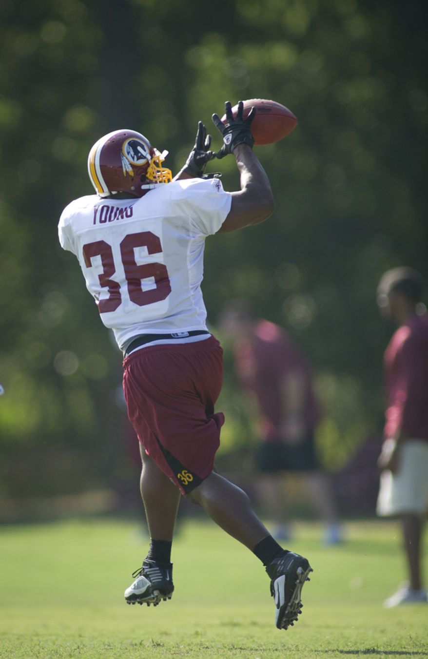 Washington Redskins fullback Darrel Young pulls down a pass during training camp drills on Monday, Aug. 8, 2011. (Rod Lamkey Jr./The Washington Times)