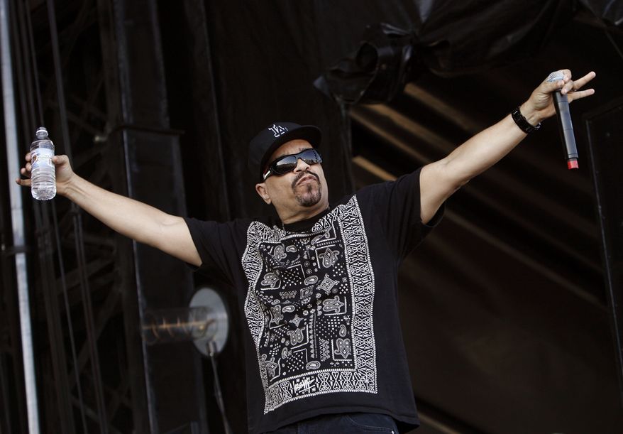 ** FILE ** In this Aug. 1, 2009, file photo, rapper Ice T performs during the All Points West music festival at Liberty State Park in Jersey City, N.J. Ice T, a former drug dealer, executive produced and narrates the upcoming VH1 documentary, "Planet Rock: The Story of Hip Hop and the Crack Generation," airing Sept. 18 at 10 p.m. EST. (AP Photo/Jason DeCrow, file)