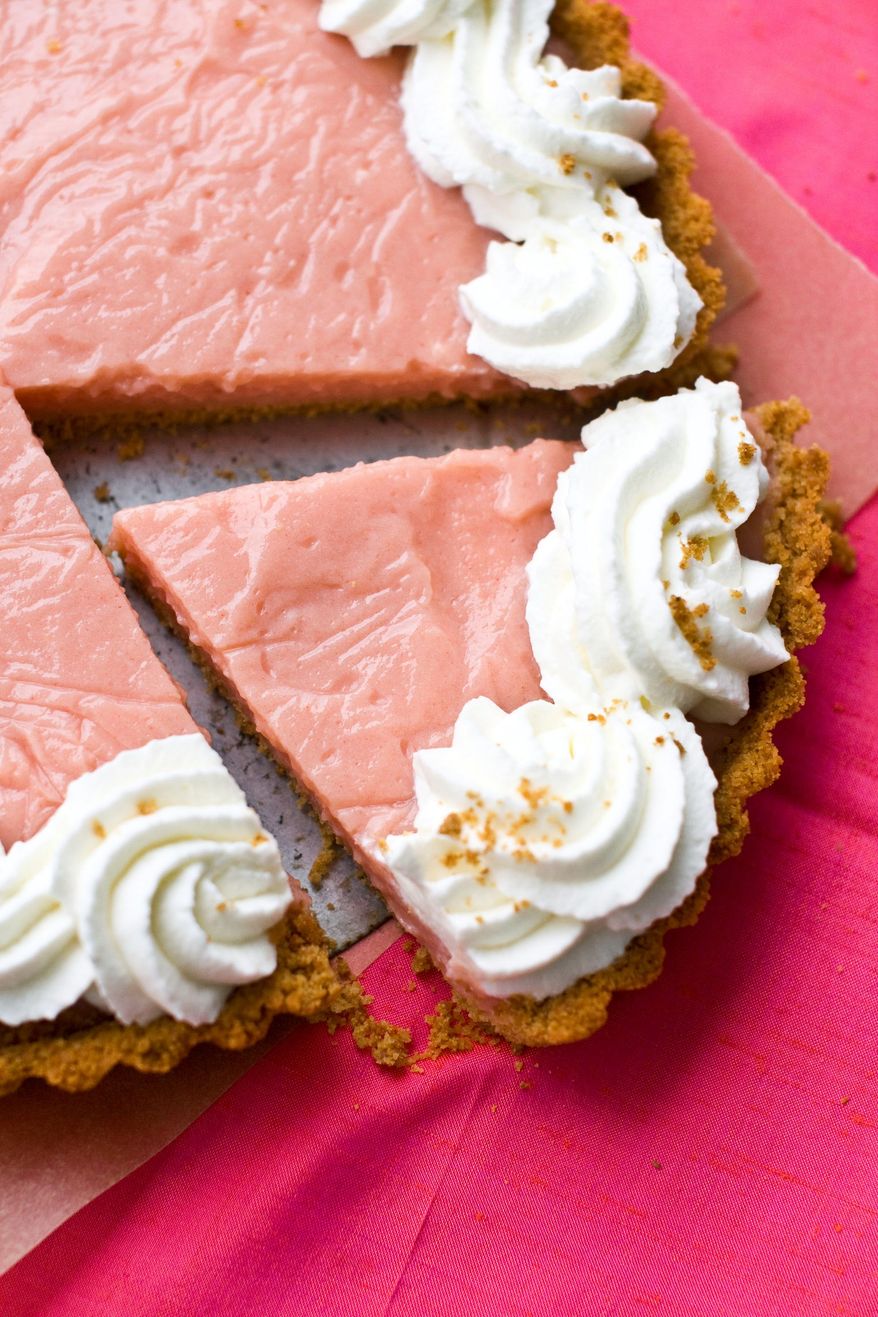 This pudding tart with a graham cracker crust is made with the pureed flesh of watermelon. Serve this summer treat with plenty of whipped cream. (Associated Press)
