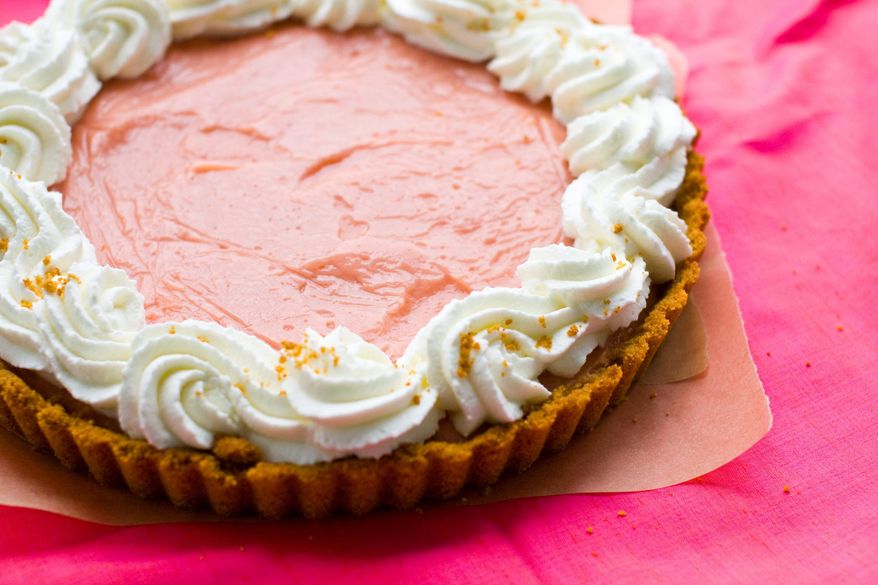 This pudding tart with a graham cracker crust is made with the pureed flesh of watermelon. Serve this summertime treat with plenty of whipped cream. (Associated Press)