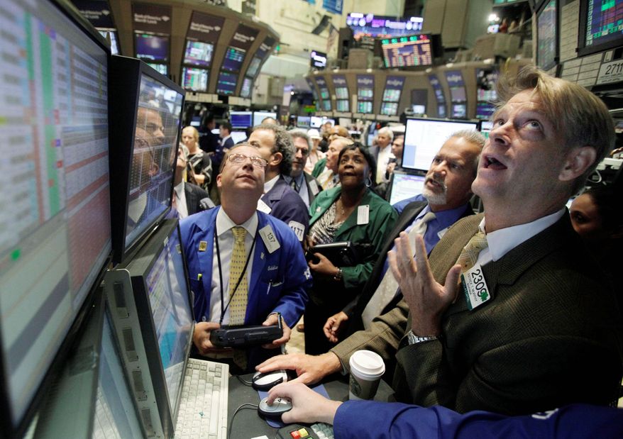 A favorable report on jobless claims was a bit of good news in a gloomy economic picture that led to gains on Wall Street on Thursday. The Dow, Standard & Poor's and Nasdaq all closed in positive territory. (Associated Press)