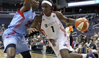 Washington Mystics&#39; Crystal Langhorne (shown in a photo against the Atlanta Dream) led the Mystics in scoring with 18 points in their 64-63 win against the New York Liberty on Friday night. (AP Photo/Manuel Balce Ceneta)