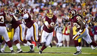 Two players vital to the Washington Redskins&#39; success against the New York Giants on Sunday will be quarterback Rex Grossman and running back Tim Hightower. (Rod Lamkey Jr./The Washington Times)