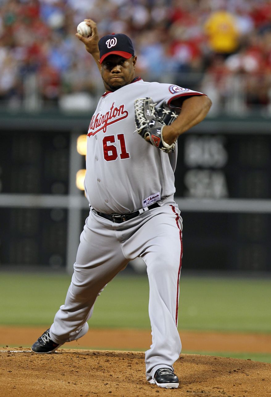 Washington Nationals starting pitcher Livan Hernandez threw 6 2/3 innings and allowed just one unearned run in the Nats' 4-2 win over the Philadelphia Phillies on Friday. (AP Photo/Alex Brandon)