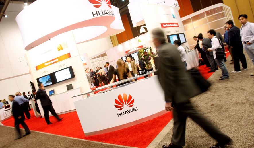 Huawei made its presence at a wireless trade show in Las Vegas this year. Some in Congress fear the Chinese telecommunications giant, said to have ties to China&#39;s military, poses a risk to national security with its deal to supply components to a supercomputer lab that is a defense contractor. (Associated Press)