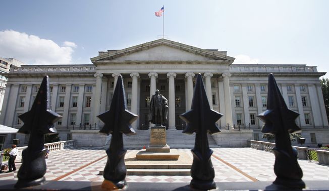 A statue of former Treasury Secretary Albert Gallatin stands guard outside the Treasury Building in Washington.