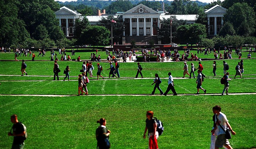 Students crisscross the campus of the University of Maryland at College Park. (The Washington Times) ** FILE **