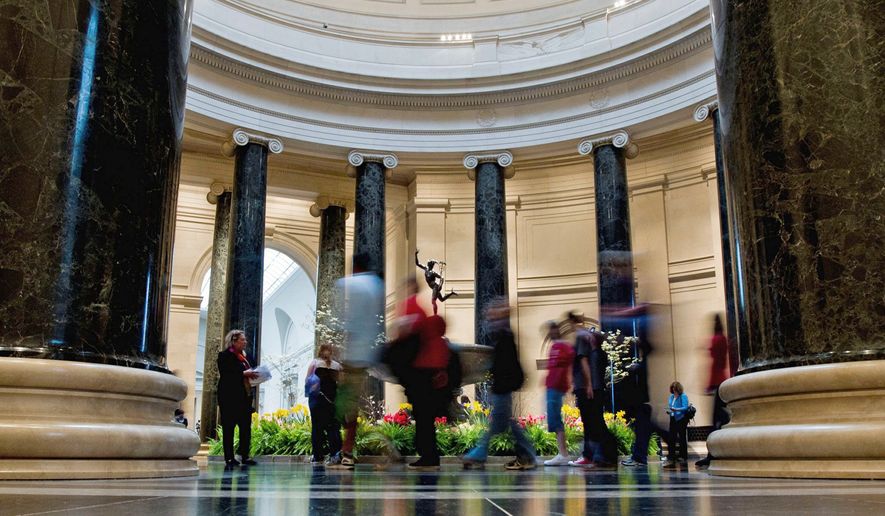 Patrons walk through the National Gallery of Art in Washington on April 8, a week after Matisse&#39;s &quot;The Plumed Hat&quot; was vandalized. (Associated Press)