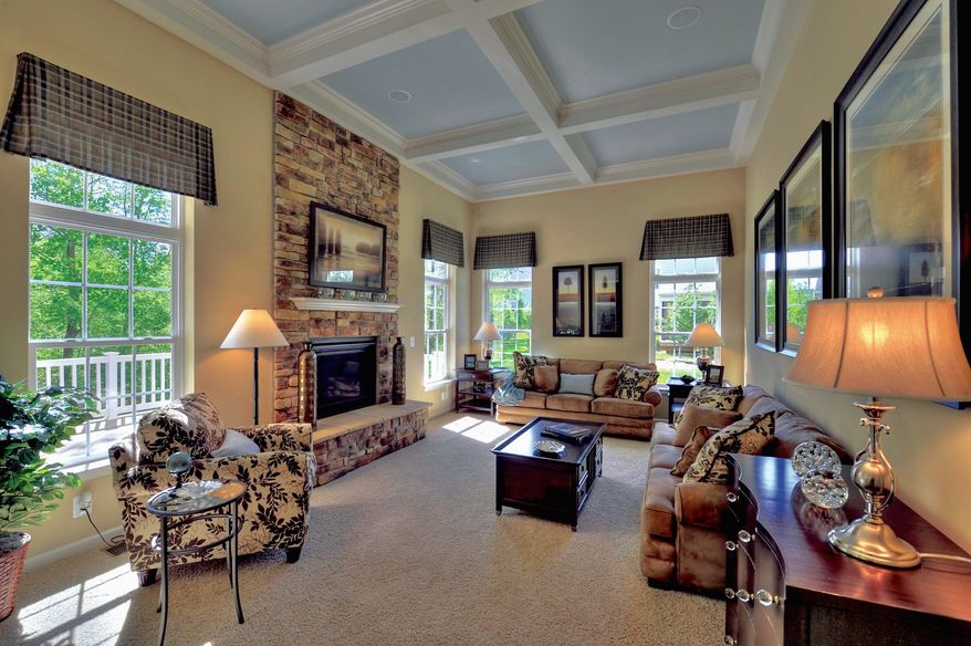 The Yates model includes a family room with a 12-foot ceiling that opens to the breakfast area and kitchen. Buyers can add a fireplace, a coffered ceiling and extra windows to the family room.