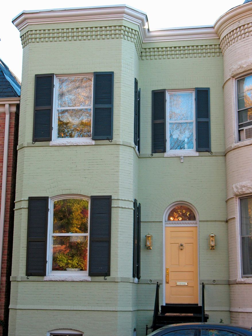 The Victorian-style town house at 3204 Q St. NW is on the market for $1,569,000. The home, built circa 1900, has four bedrooms over three finished levels, including an in-law suite on the lower level.