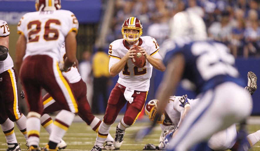 Washington Redskins quarterback John Beck steps up into the pocket during Friday&#x27;s preseason game against the Indianapolis Colts. In his first start game action since 2007, he completed 14 of 17 passes for 140 yards, no touchdowns and no interceptions in the first half.  (AP Photo/Michael Conroy)